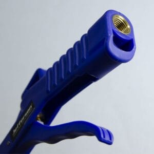 Close-up of the Long Plastic Blow Gun - JEFA010 featuring a blue plastic handle and threaded brass nozzle on a plain background, ideal for tool hire Newry.