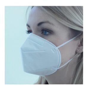FFP2 Particulate Respirator Masks 50pks-2 A woman with blonde hair wears a white FFP2 Particulate Respirator Mask (50pk), looking to the side against a light backgroundโideal for promoting safety at tool hire Newry locations.