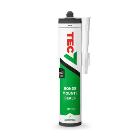 A 310ml tube of Tec 7 Bonds Mounts Seals adhesive, featuring a white nozzle and designed for bonding, mounting, and sealing—available at Tool Hire Newry.