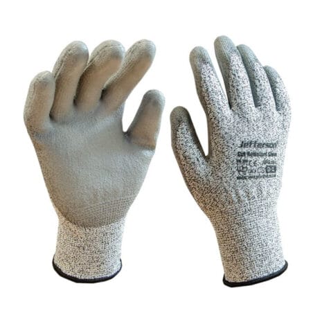 The Jefferson Cut Resistant Gloves are grey protective gloves with a textured surface and printed text on the back, perfect for safely handling equipment from tool hire Newry.