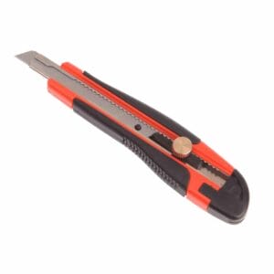 A retractable utility knife with a black and red handle and an exposed metal blade, available for tool hire in Newry, isolated on a white background.