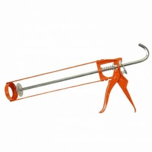 An empty orange metal caulking gun with a trigger handle, designed to hold and dispense sealant or adhesive tubes; available through tool hire Newry.