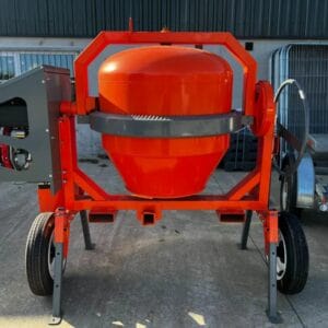 The Cargo Tow Behind Mixer is a bright orange portable concrete mixer with two wheels and a large drum, ideal for tool hire in Newry, shown standing on an outdoor paved surface.