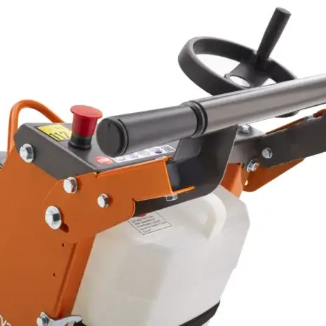 Husqvarna FS 400 LV Floor Saw-2 Close-up of the handle and control panel on a Husqvarna FS 400 LV Floor Saw, available at Tool Hire Newry, featuring a steering wheel, red emergency stop button, and a white tank.